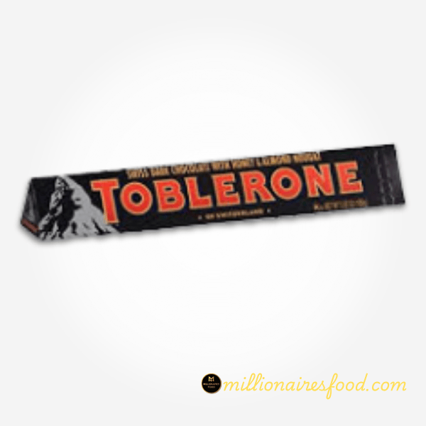Toblerone Dark Chocolate With Honey & Almond Nougat- 100gm 395 Toblerone Dark Chocolate With Honey & Almond Nougat 100gm - Image 1