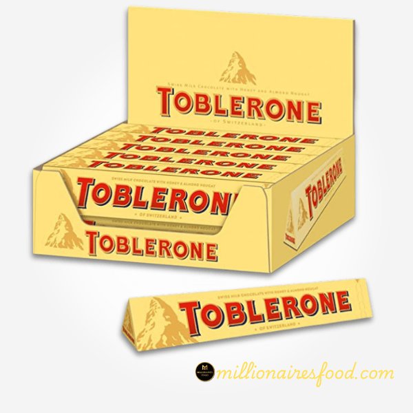 Toblerone Milk Chocolate With Honey & Almond Nougat 100g X 10 PC'S 3450 Toblerone Milk Chocolate With Honey & Almond Nougat 100g x 10 PCS - Image 1